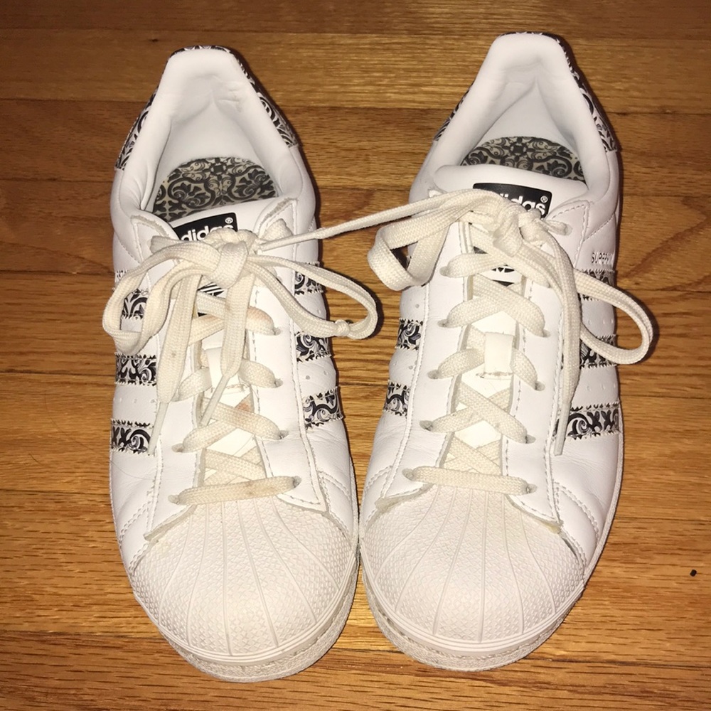 Black and white superstar adidas